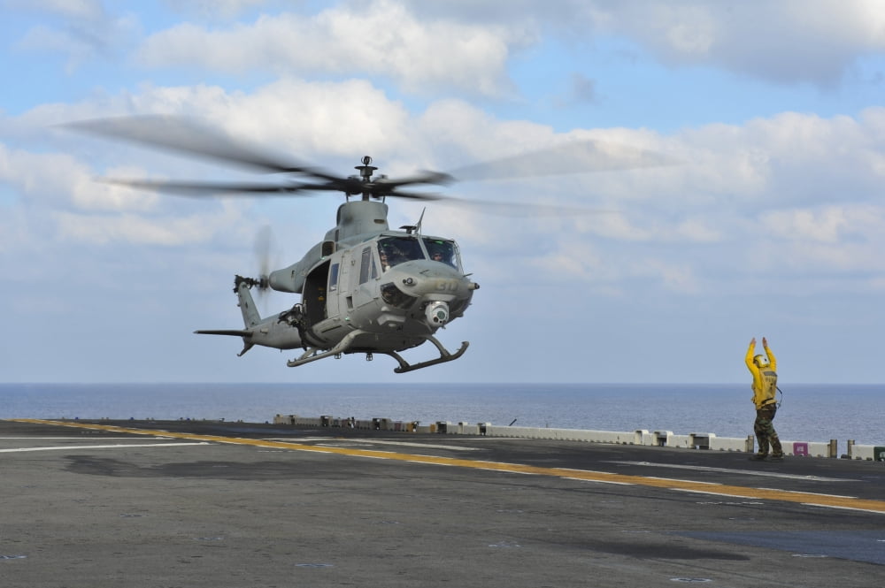 Aviation Boatswains Mate directs a UH-1Y Venom Canvas Art - Stocktrek Images (35 x 23)