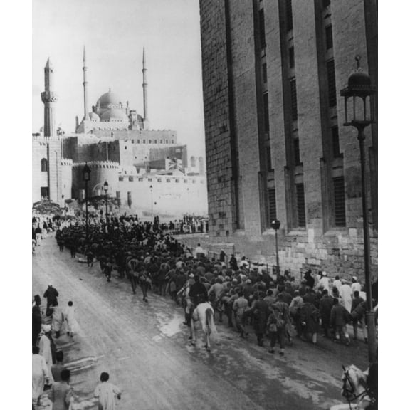 Axis Prisoners Captured In Libya Nearing The Citadel Of Cairo. Italian And German Pows March Within View Of The Mohamed Ali Mosque Above And The Mosque Of Sultan Hassan. Ca. 1942 During World War 2.