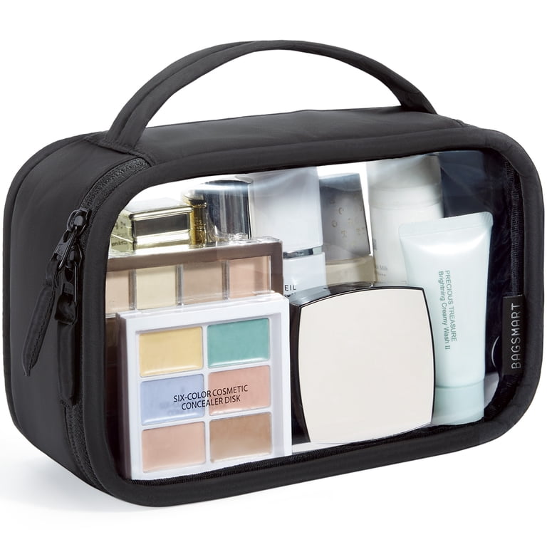 clear toiletry bag for long air travel in Jet Black A branded elastic loop holds your toothbrush or makeup brush and a leather top handle that makes it easy to carry Clear Travel Bag | TSA