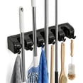 thumbnail image 1 of FVSA Broom Holder Wall Mount with 5 Slots and 6 Hooks, Plastic Organizer for Kitchen Laundry Room Home Storage, Black, 1 of 7