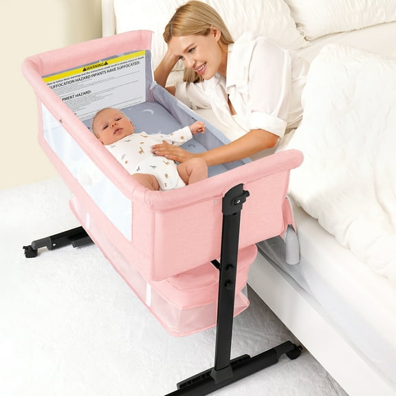 Baby Bassinet Bedside Crib Foldable Portable with Adjustable Height, Wheels, and Storage Basket, Pink
