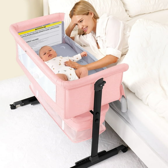 Baby Bassinet Bedside Crib Foldable Portable with Adjustable Height, Wheels, and Storage Basket,Pink