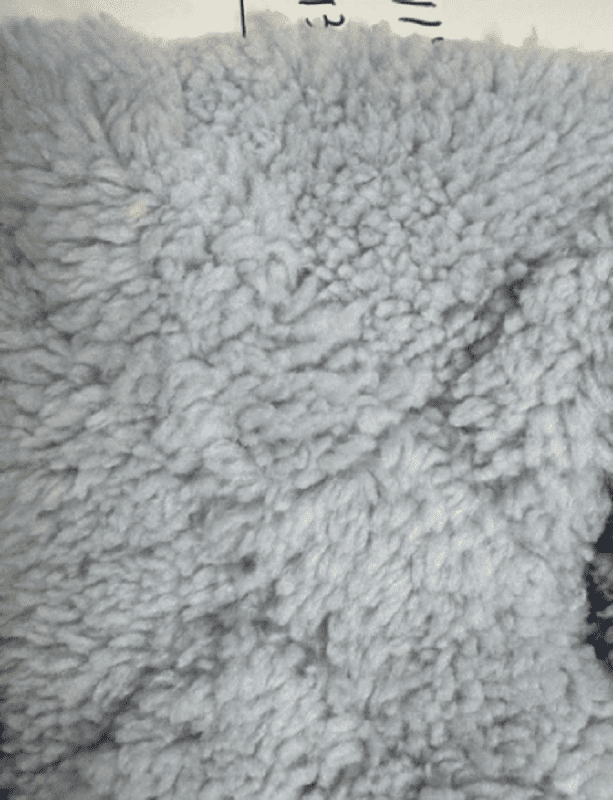 Furry fabric fleece comfy crumpled bedroom blanket Stock Photo by ©golubovy  215636266