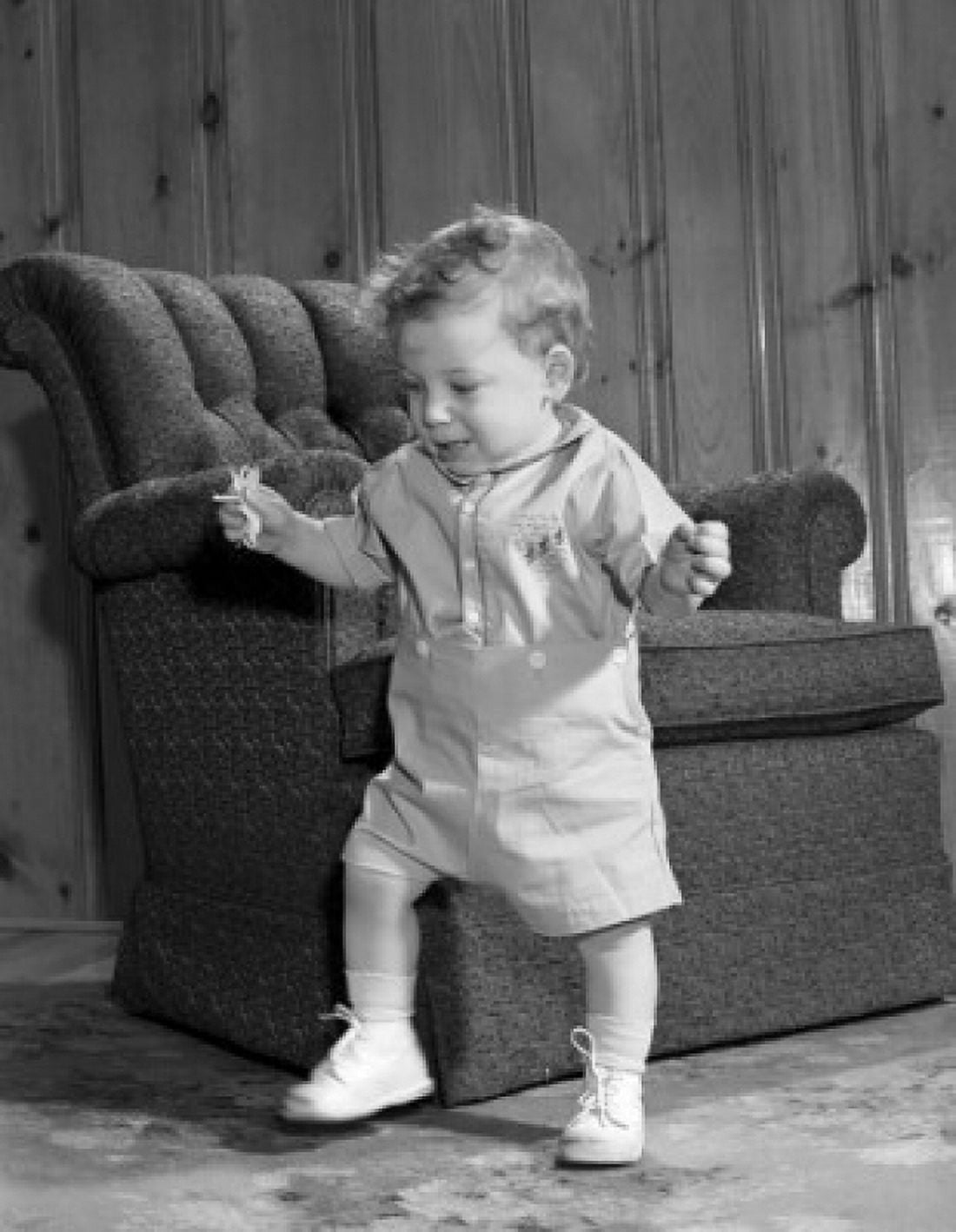 Baby boy doing first steps Canvas Art - (24 x 36)