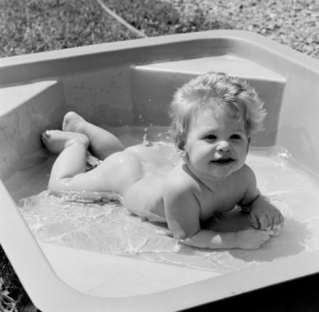 Baby boy in outdoor play pool Canvas Art - (18 x 24)