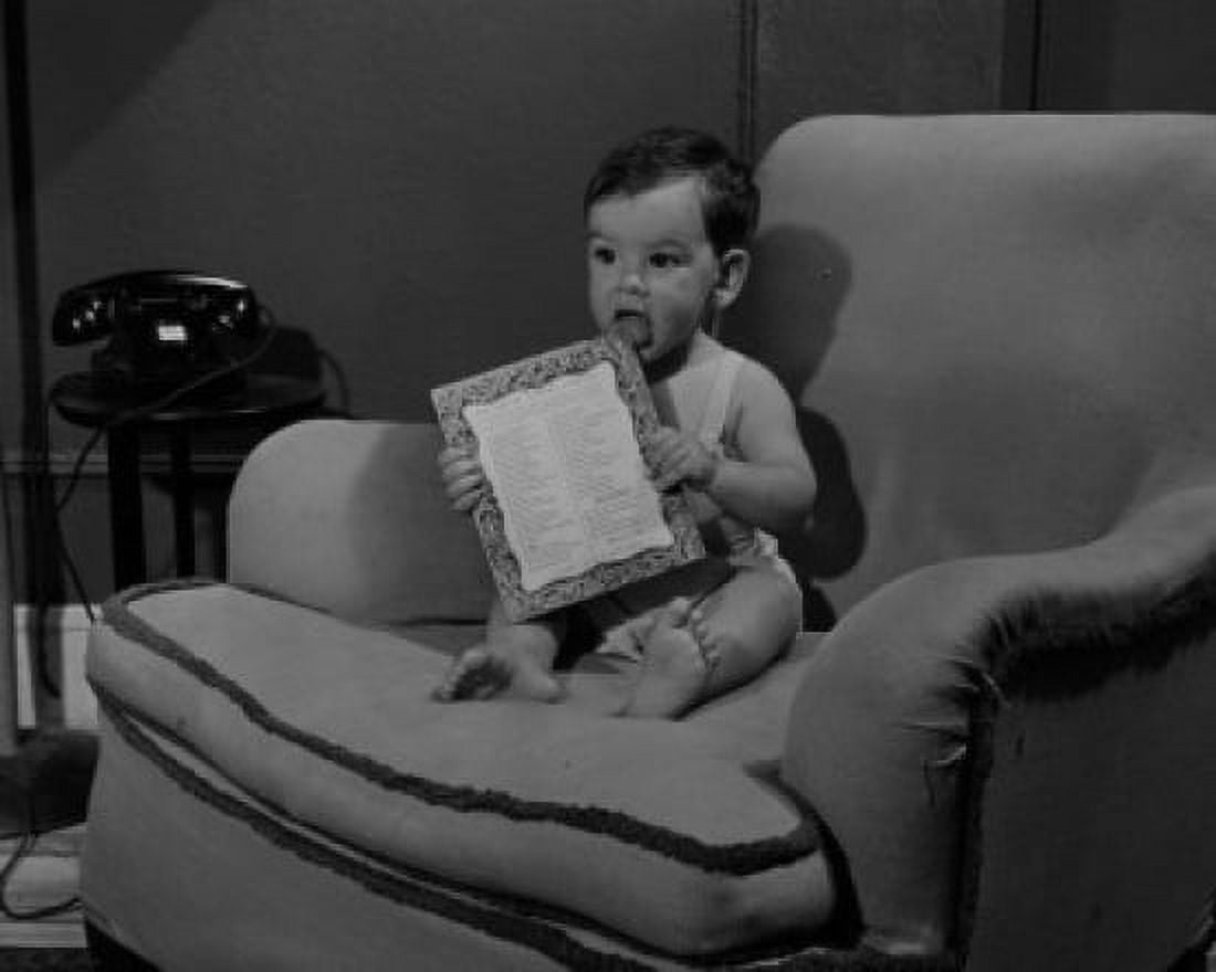 Baby boy on sofa Canvas Art - (24 x 36)