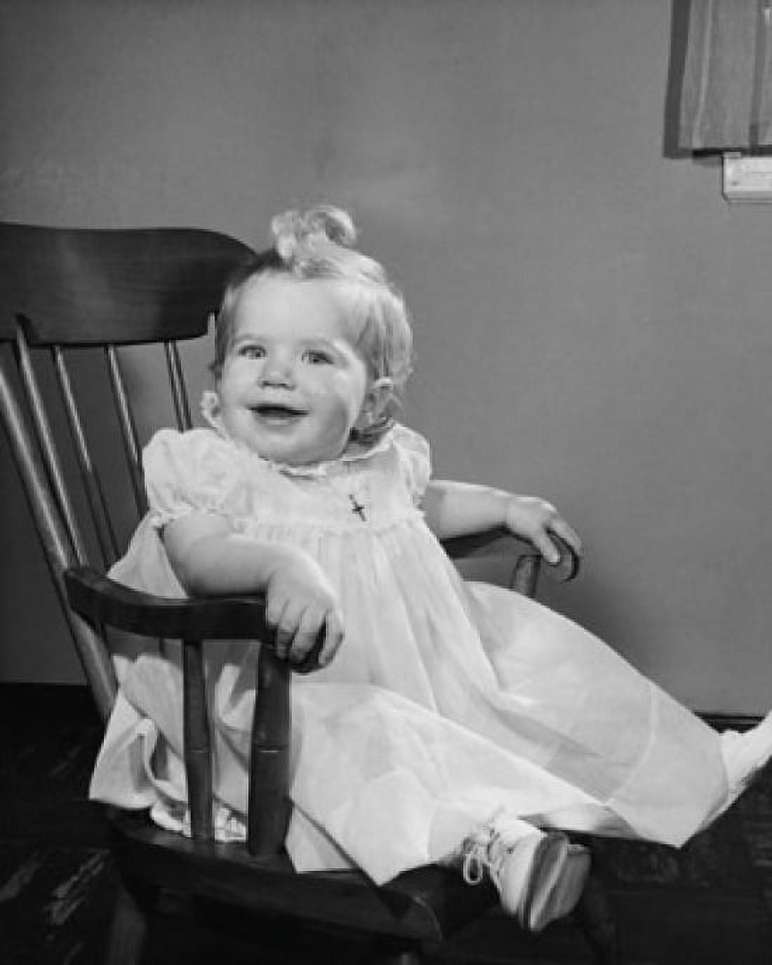 Baby girl sitting in an armchair and smiling Canvas Art - (24 x 36)