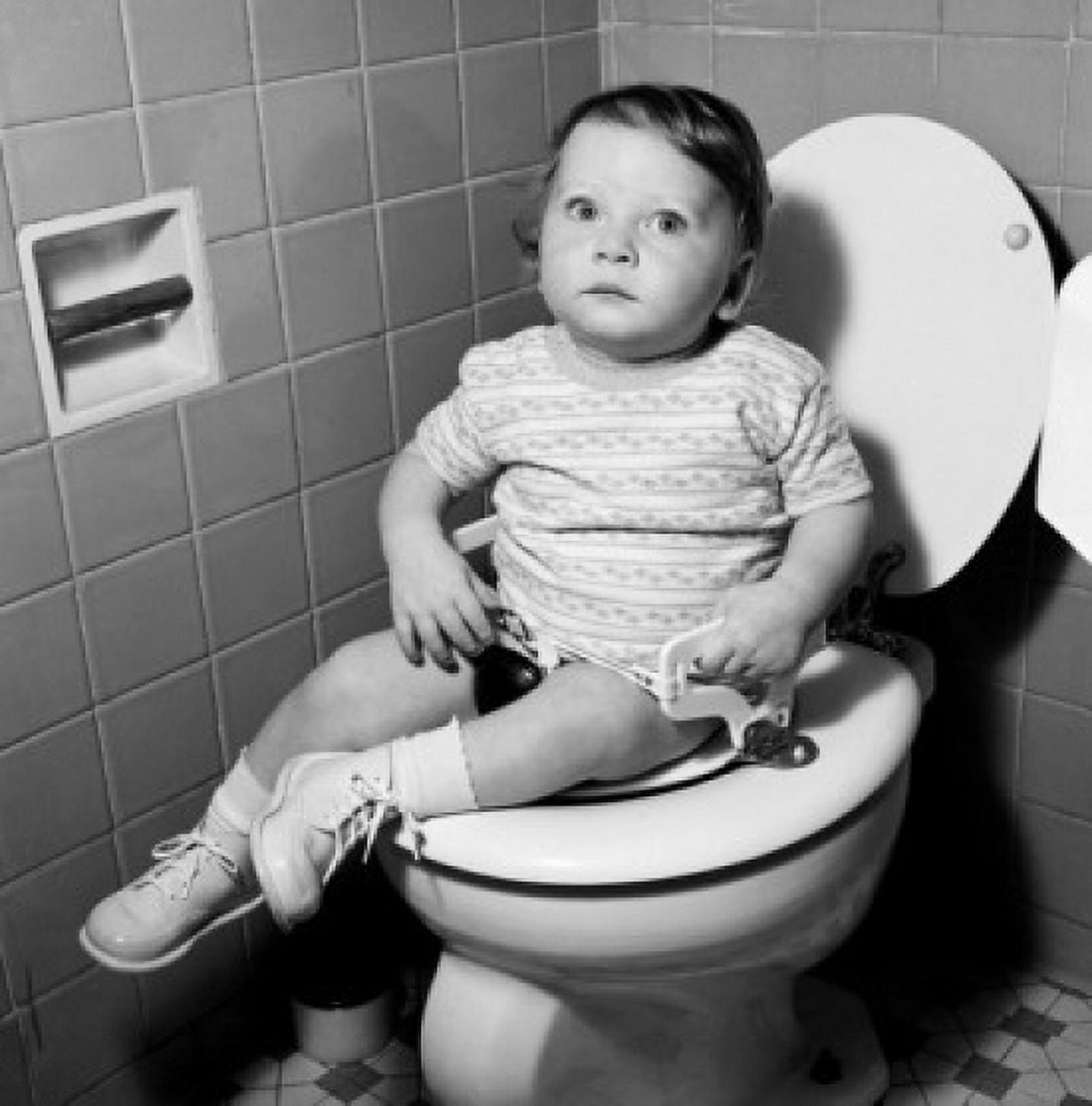 Baby girl sitting on toilet Canvas Art - (18 x 24)