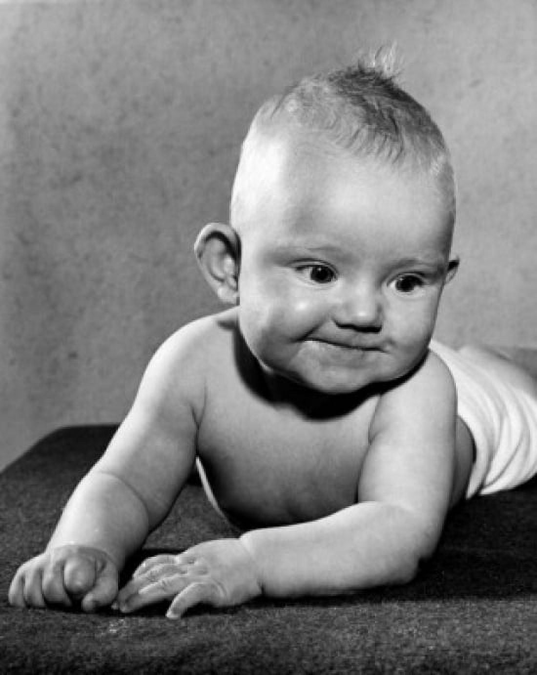 Baby lying on front Canvas Art - (24 x 36)