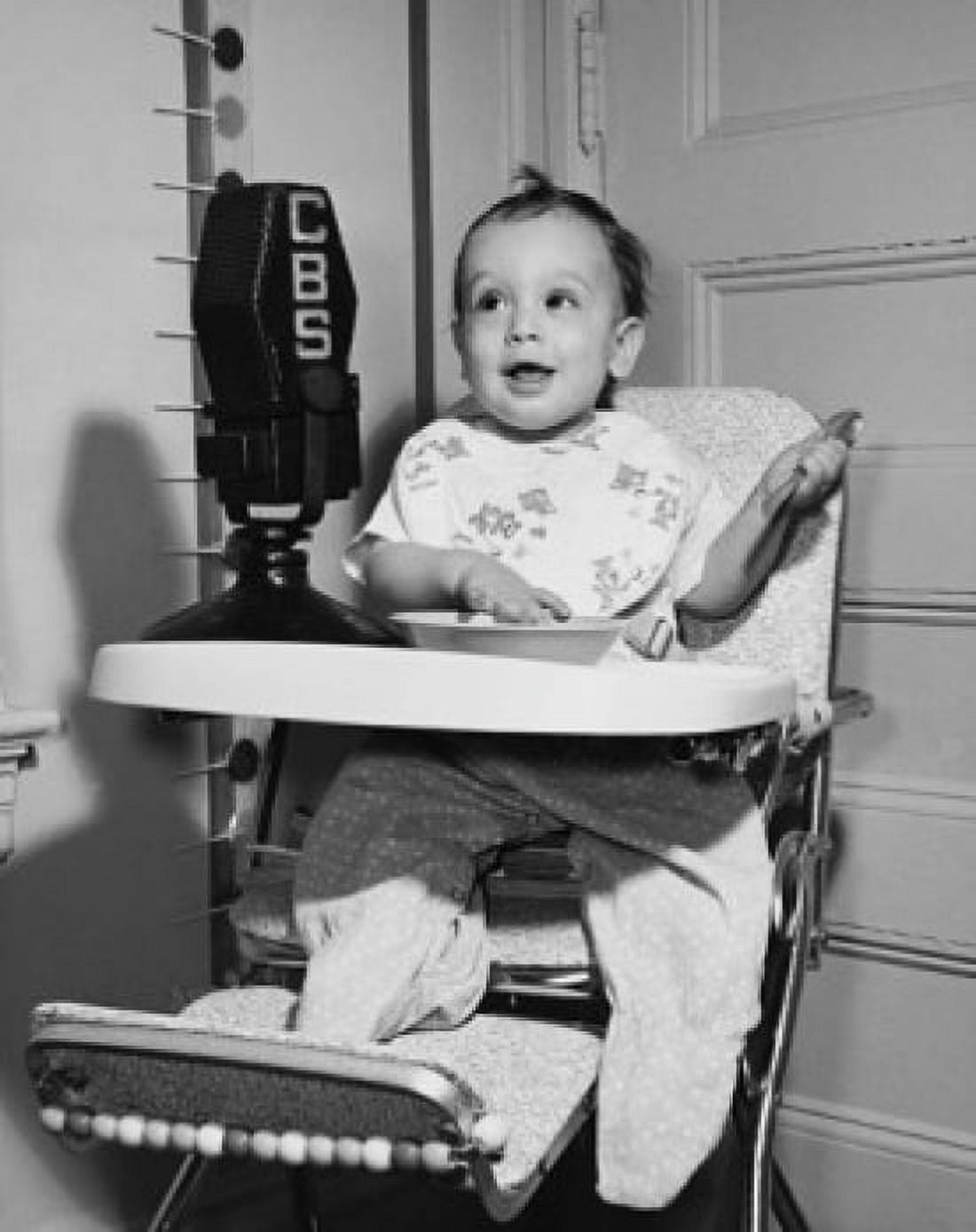 Baby sitting in a high chair Canvas Art - (18 x 24)