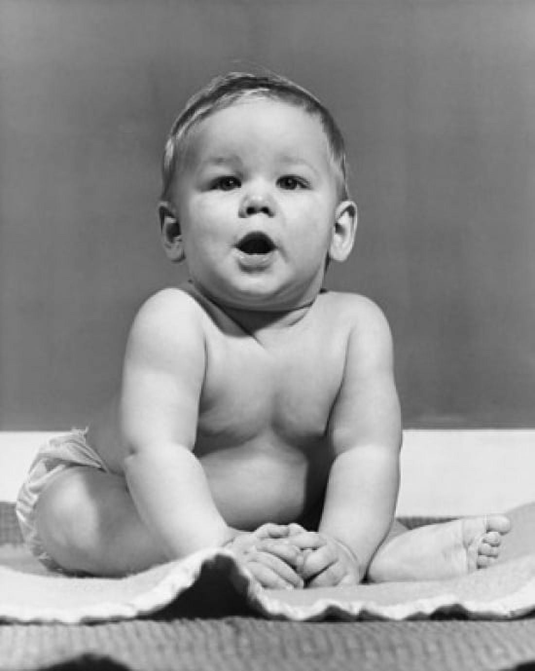 Baby sitting with its mouth open Canvas Art - (18 x 24)