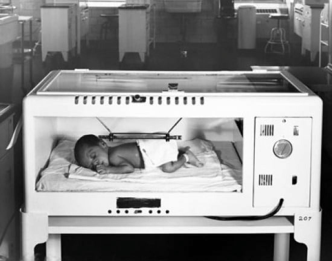 Baby sleeping in an incubator Canvas Art - (18 x 24)