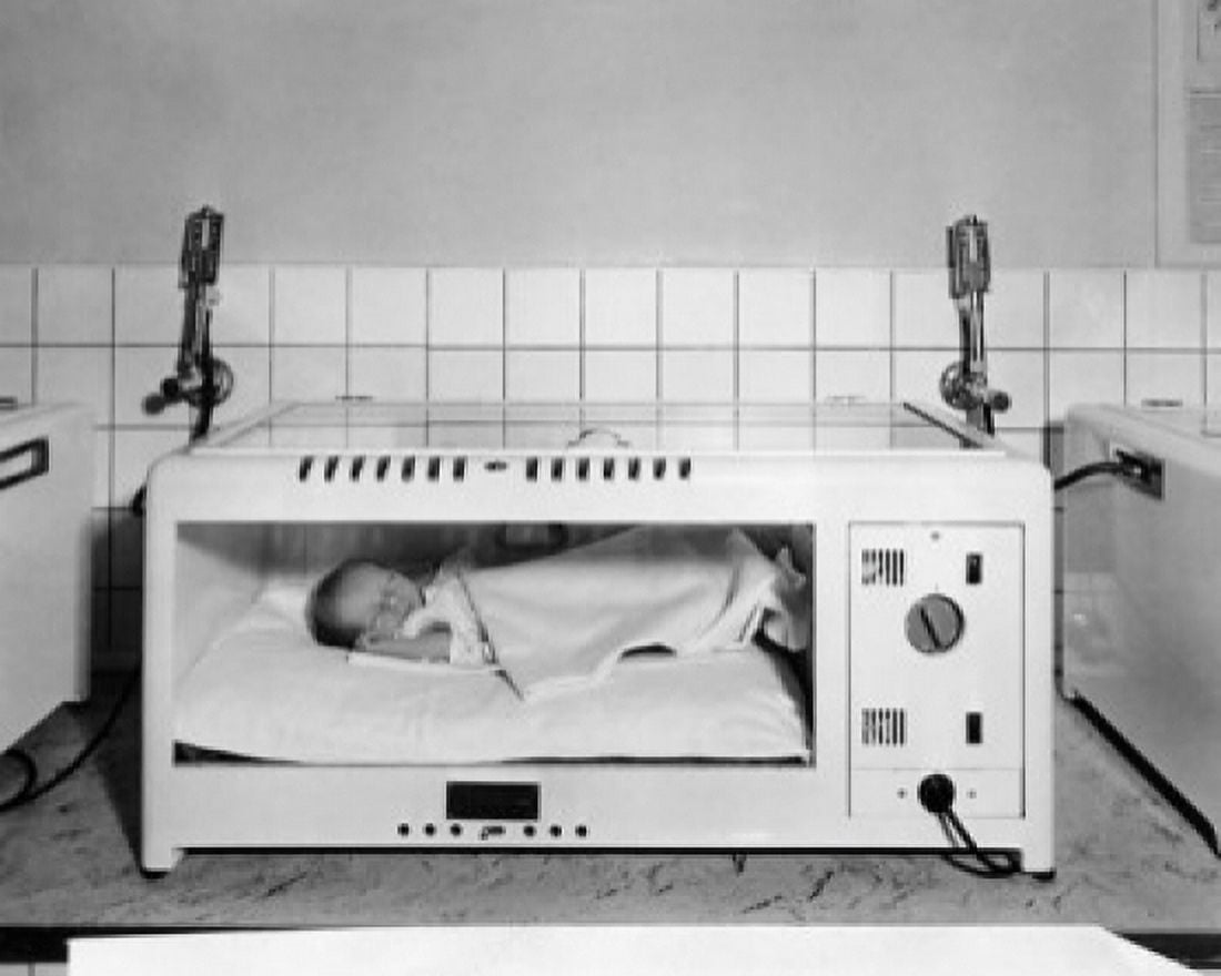 Baby sleeping in an incubator Canvas Art - (24 x 36)