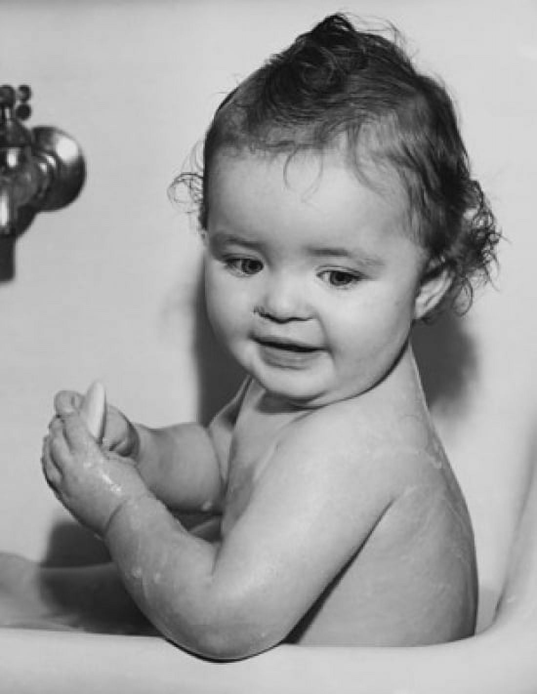 Baby smiling in a bathtub Canvas Art - (18 x 24)