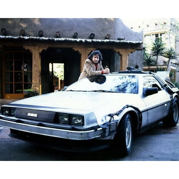 Back To The Future Steven Spielberg poses with 1982 DeLorean car 16x20 Poster