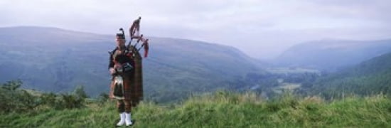 Bagpiper at Loch Broom in Scottish highlands Ross and Cromarty Scotland Canvas Art - Panoramic Images (36 x 12)