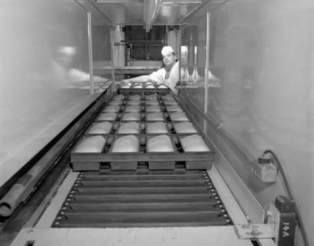 Baker baking breads in a bakery Nissen Bakery Worcester Massachusetts USA Canvas Art - (24 x 36)