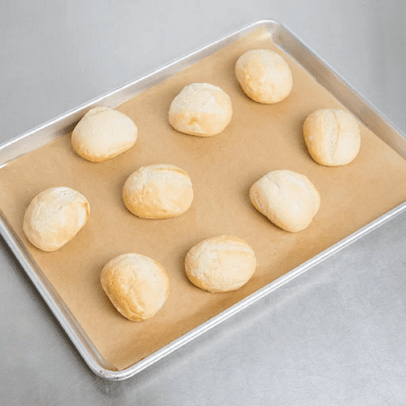 Baker's Mark 12" x 16" Half Size Unbleached Quilon® Coated Parchment Paper Bun / Sheet Pan Liner Sheet - 100 pc