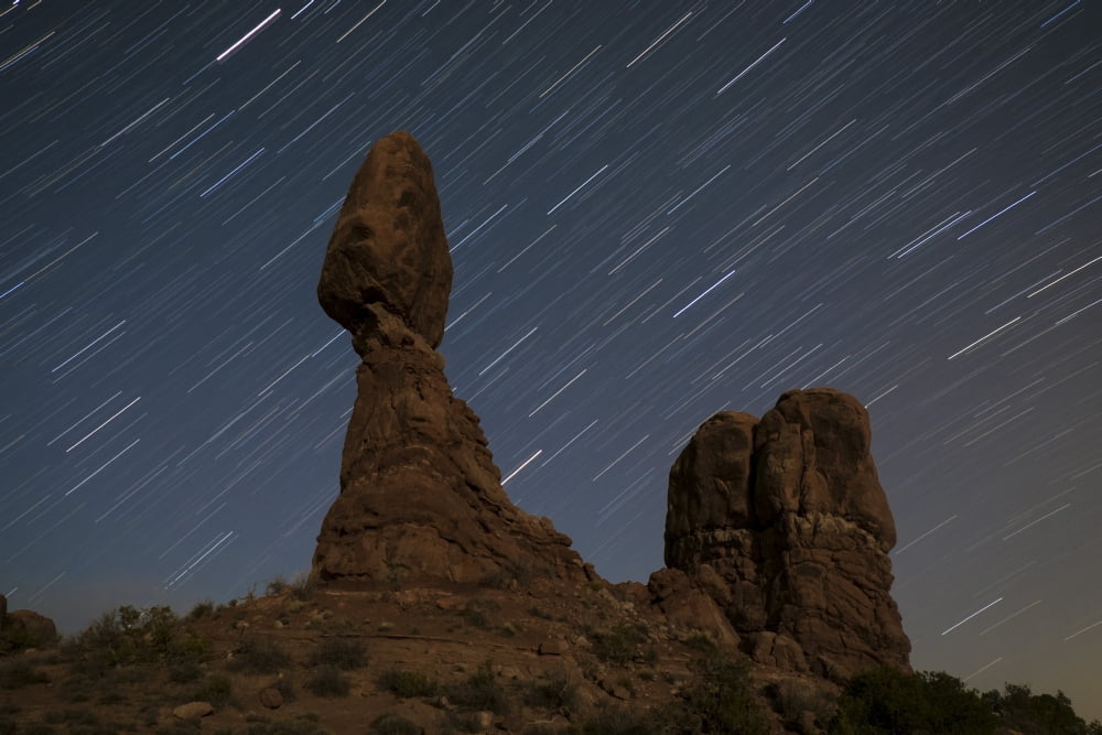 Balanced Rock against a backdrop of star trails Arches National Park Utah Canvas Art - Dan BarrStocktrek Images (18 x 12)
