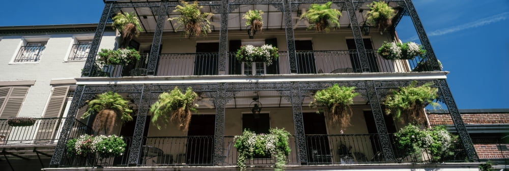 Balconies of a building French Quarter New Orleans Louisiana USA Canvas Art - Panoramic Images (36 x 12)