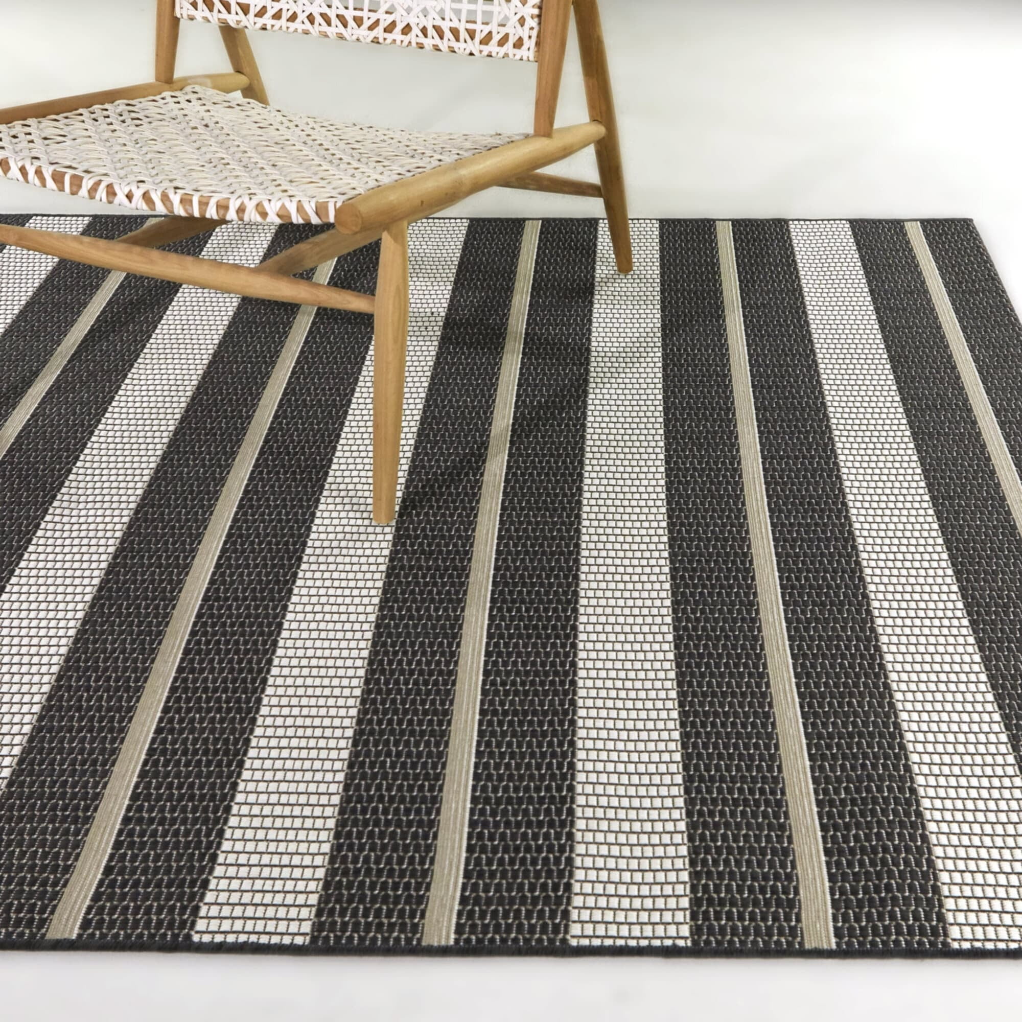 Adson Black and White Synthetic Stripe Patio Area Rug