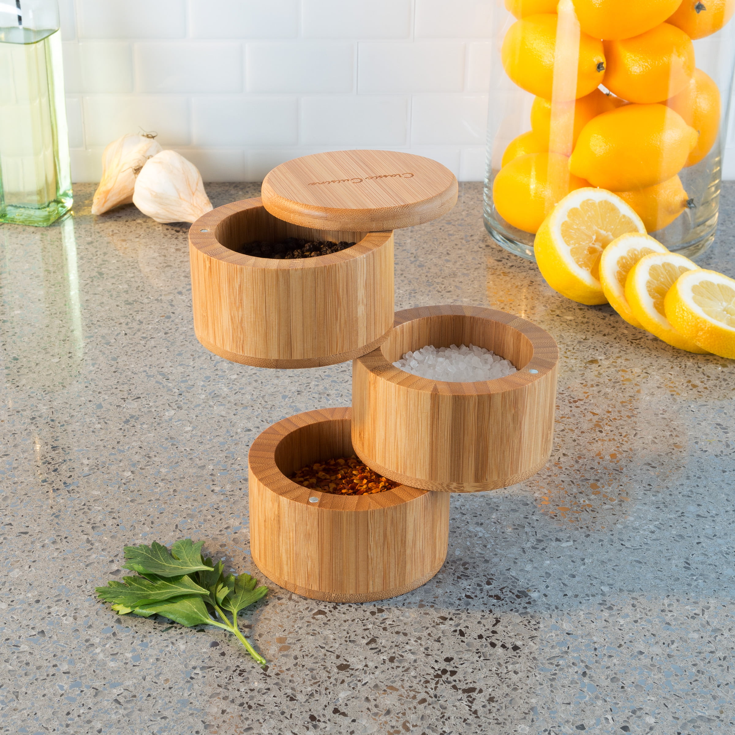 Square bamboo-lid spice jars available in three sizes: •Small (6.3