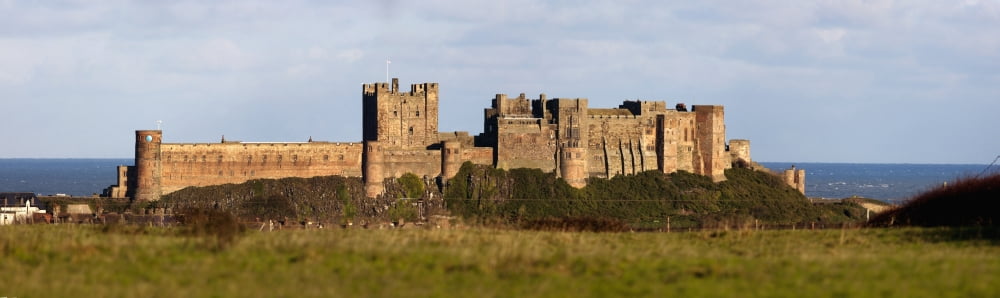 Bamburgh Castle Bamburgh Northumberland England Canvas Art - John Short Design Pics (44 x 13)