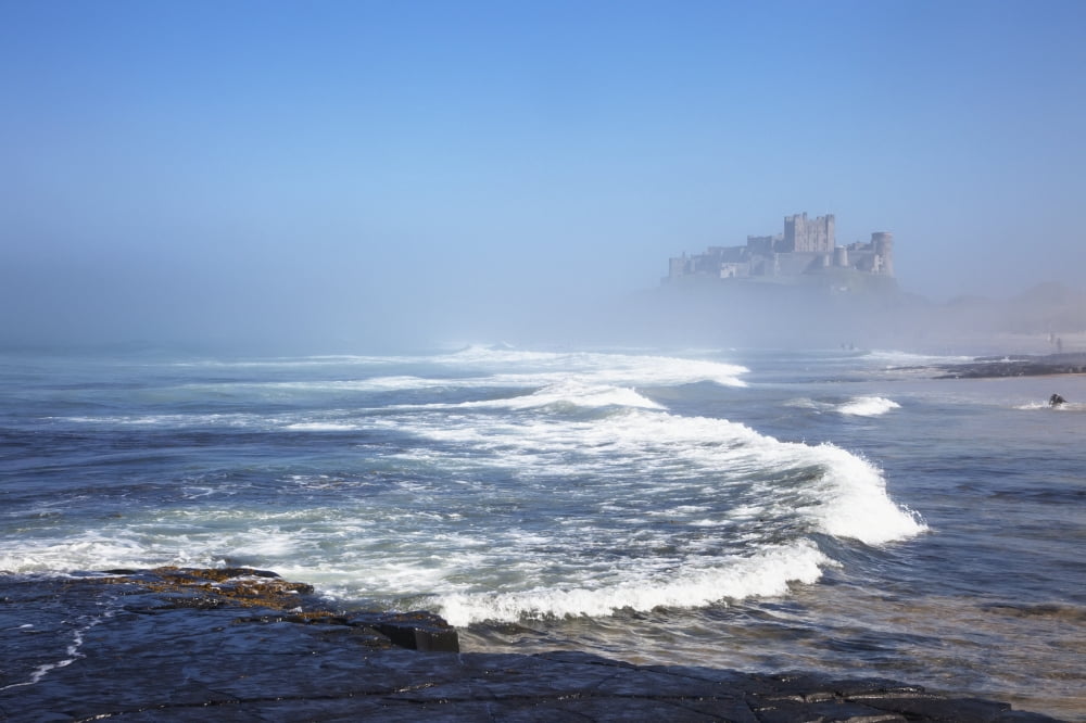 Bamburgh Castle In The Fog Bamburgh Northumberland England Canvas Art - John Short Design Pics (19 x 12)