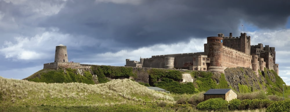 Bamburgh Castle Northumberland England Canvas Art - John Short Design Pics (44 x 18)