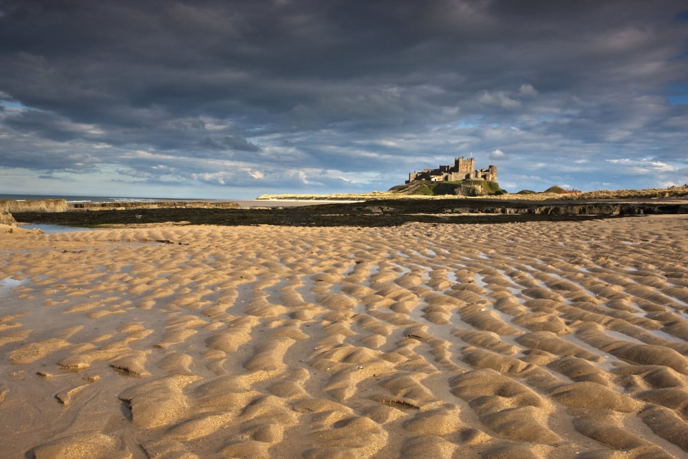 Bamburgh Northumberland England View Of Bamburgh Castle From A Sandy Beach Canvas Art - John Short Design Pics (38 x 24)