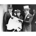 thumbnail image 1 of Barbara Hutton Haugwitz-Reventlow Holds Her Son Lance After His Christening In London. June 1936. L-R Franklin Hutton, 1 of 1