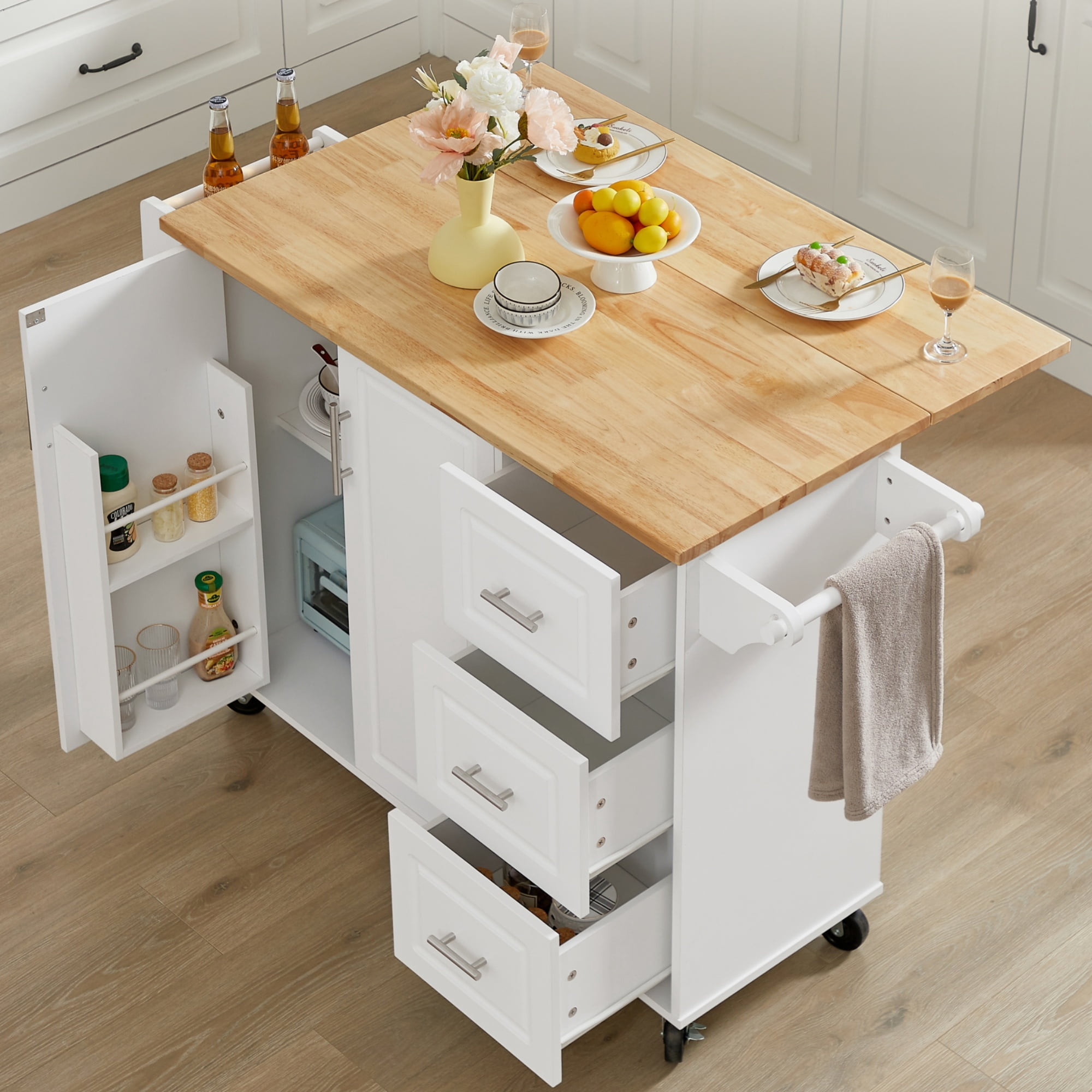 Garitin 54"Kitchen Island with Storage, Rolling Small Kitchen Island Cart on Wheels, Drop‑Leaf Countertop Microwave Utility Cart with 3 Drawers & 1 Storage Cabinet, White