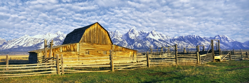 Barn in a field with mountain range in the background Moulton Barn Mormon Row Teton Range Mormon Row Historic District Grand Teton National Park Wyoming USA Canvas Art - Panoramic Images (27 x 9)