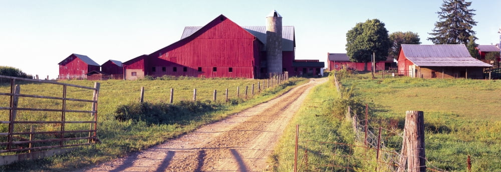 Barn in a field Pennsylvania Dutch Country Lancaster County Pennsylvania USA Canvas Art - Panoramic Images (27 x 9)