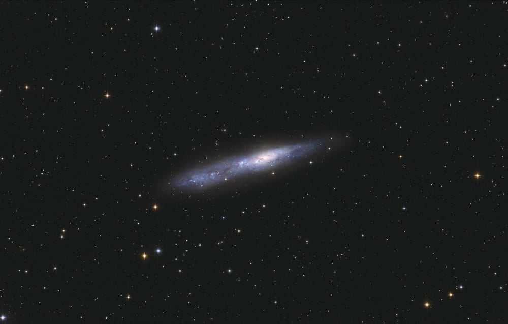 Barred spiral galaxy NGC 55 in the constellation Sculptor Canvas Art - Lorand FenyesStocktrek Images (18 x 11)