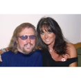thumbnail image 1 of Barry Gibb and wife Linda at a Red Cross benefit at the Astor Hotel in South Beach. Miami Beach FL 9-22-2001. Photo By Adam, 1 of 1