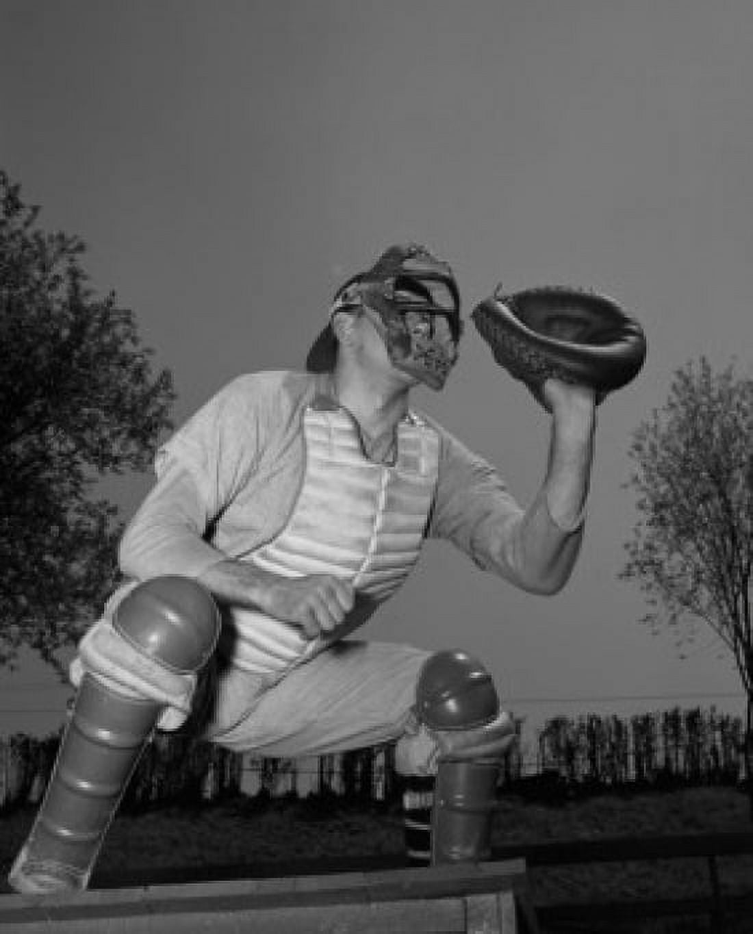 Baseball catcher holding mitt outdoors Canvas Art - (18 x 24)