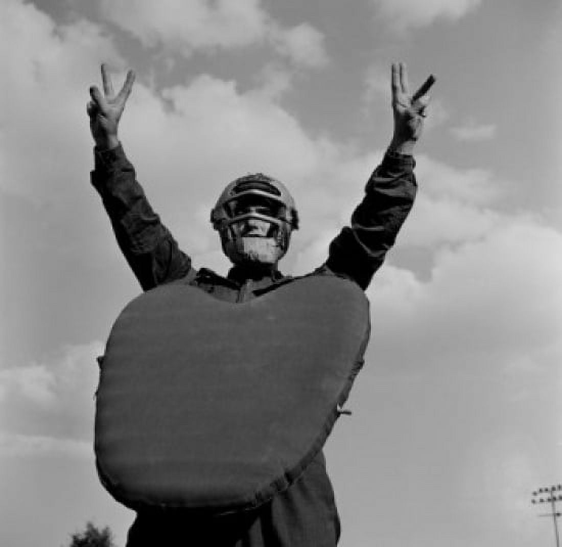 Baseball player wearing helmet and chest protector Canvas Art - (18 x 24)