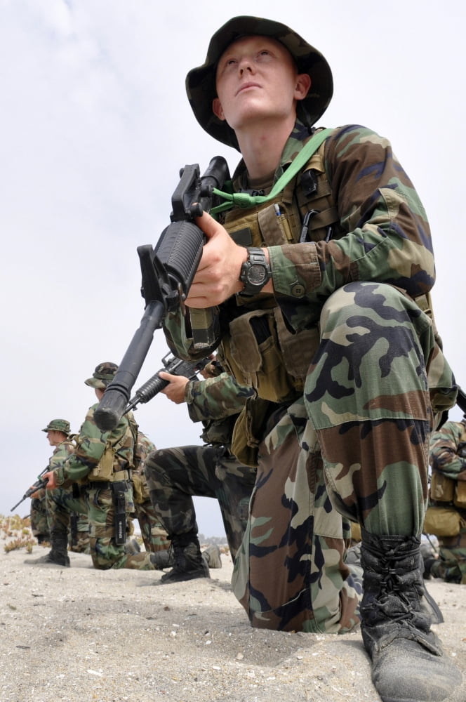 Basic Underwater DemolitionSEAL (BUDS) students conduct a patrolling exercise Canvas Art - Stocktrek Images (23 x 34)