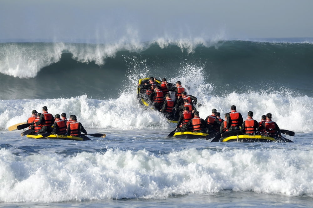 Basic Underwater DemolitionSEAL students participate in Surf Passage at Naval Amphibious Base Coronado Canvas Art - Stocktrek Images (34 x 23)