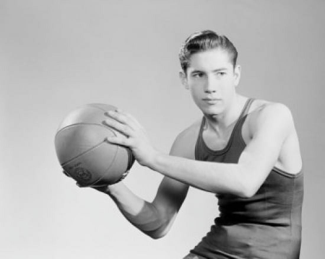 Basketball player holding ball Canvas Art - (24 x 36)