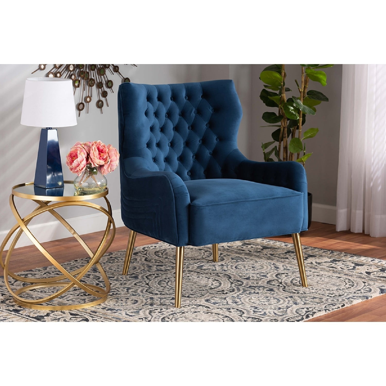 Curvaceous Navy Blue Velvet Armchair with Geometric Stitching and Gold Metal Legs