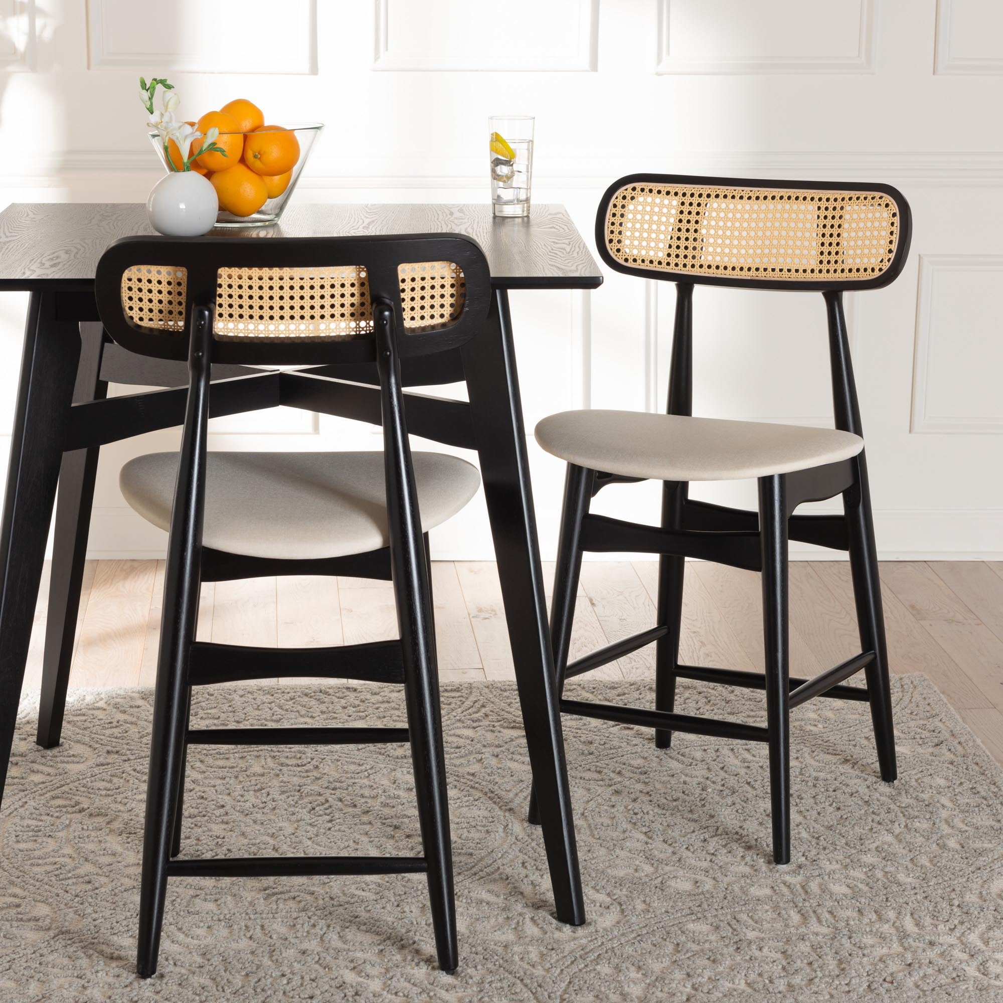 Baxton Studio Tarana Mid-Century Modern Cream Fabric and Black Finished Wood 2-Piece Counter Stool Set