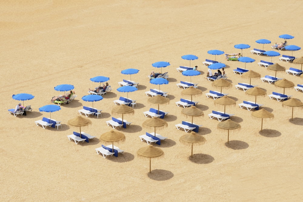 Beach Chairs And Umbrellas Set Up In Row On The Beach Albufeira Algarve Portugal Canvas Art - Michael Thornton Design Pics (38 x 24)