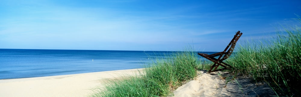 Beach chair on the beach Lake Michigan Holland Michigan USA Canvas Art - Panoramic Images (27 x 9)