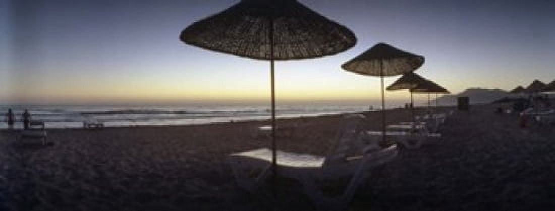 Beach chairs and straw sun umbrellas on Patara Beach on the Mediterranean Sea at sunset Patara Antalya Province Turkey Canvas Art - Panoramic Images (15 x 6)
