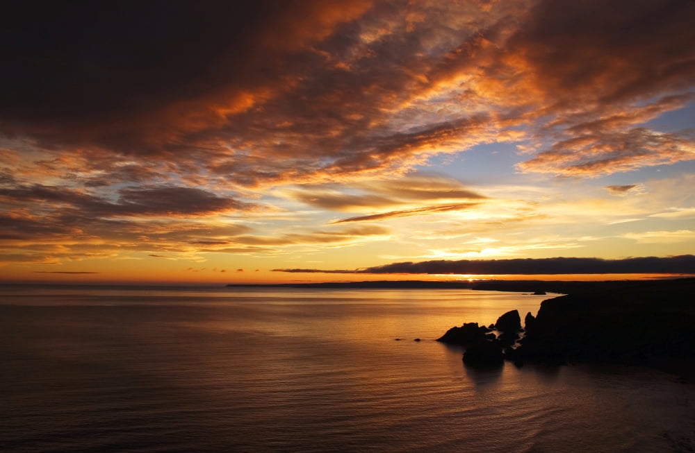 Beautiful evening view from above Ballydowane Cove along the western stretch of the Copper Coast to Dungarvan Bay County Waterford Ireland Canvas Art - George Munday Design Pics (19 x 12)