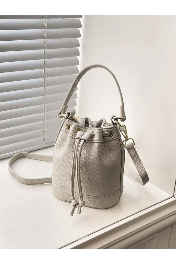 Beige Mini Bucket Handbag With Drawstring Closure And Adjustable Strap