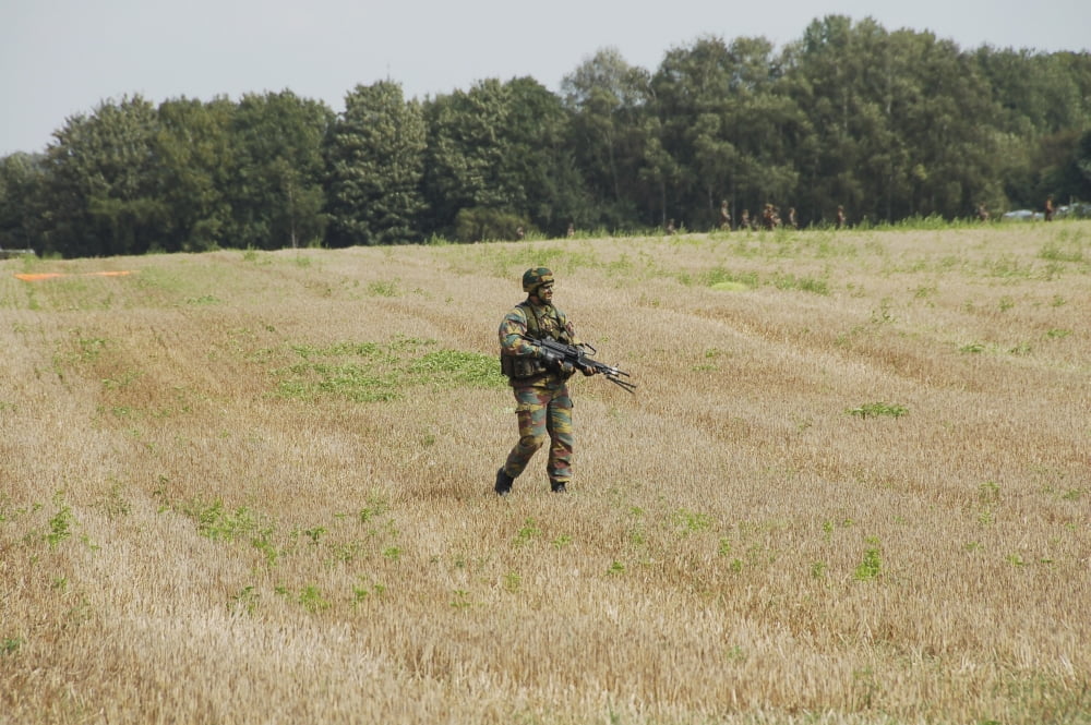 Belgian paratroopers proceeding in the fields Canvas Art - Luc De JaegerStocktrek Images (17 x 12)