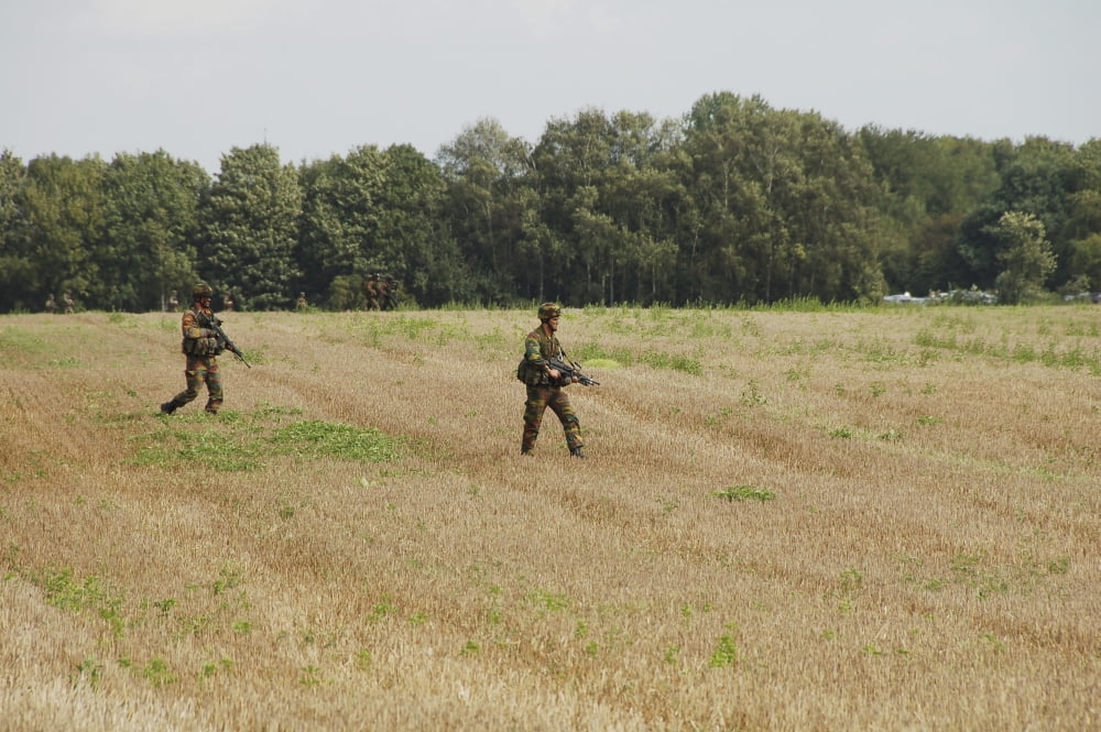 Belgian paratroopers proceeding in the fields Canvas Art - Luc De JaegerStocktrek Images (34 x 23)